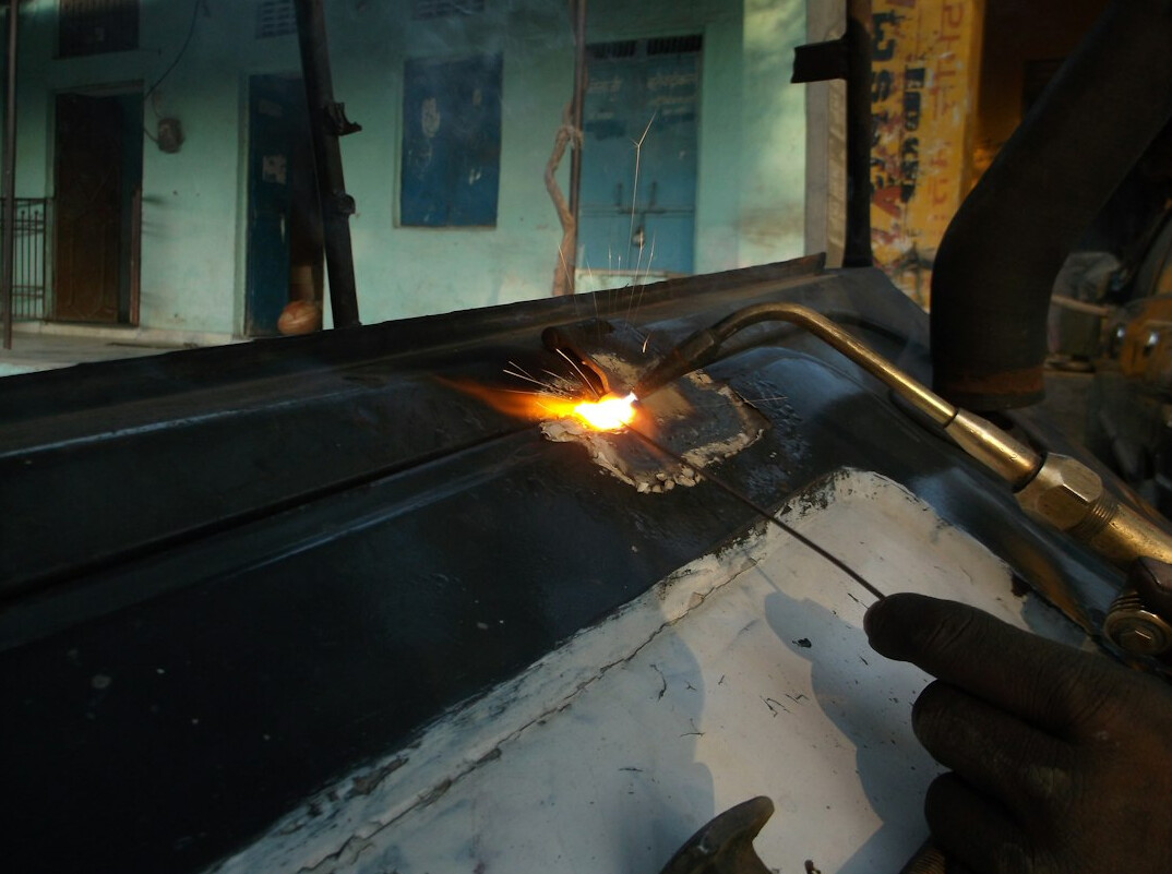 Plastic crack being welded with a hot air tool